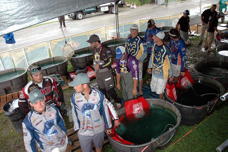 The anglers line up for the weigh-in backstage.