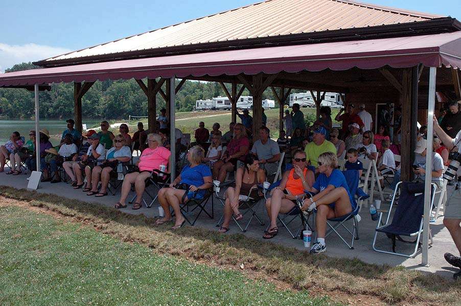 Parents find shade beneath the pavilion at the Point Resort, site of the weigh-in for the Bassmaster High School Open presented by Carhartt. 