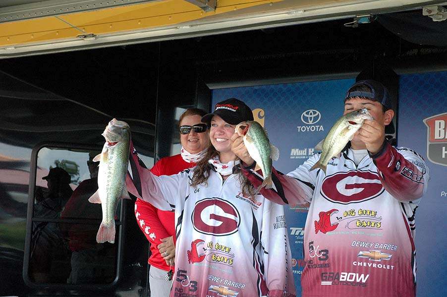 Laura Ann Foshee and D.J. Barber weigh their catch. The team is the Gardendale Rockets of suburban Birmingham, Ala.