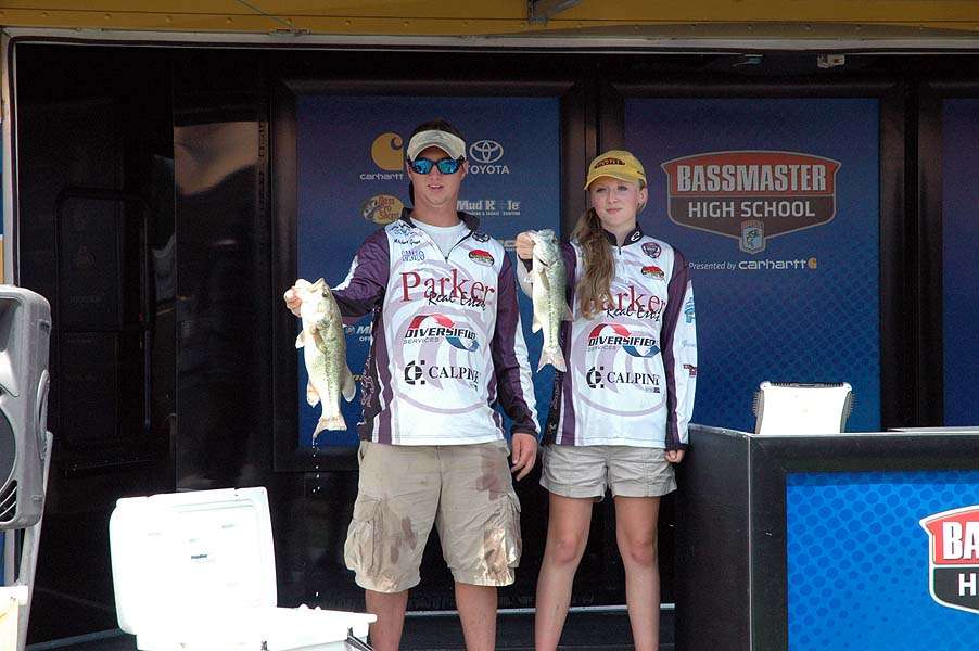 Mitchell Gowen and Brianna Tucker take to the stage with their catch. The team from Decatur Heritage Christian Academy is from Decatur, Ala. 