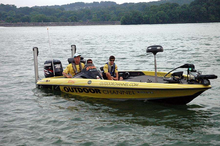 A boat with the logo of Outdoor Channel is boat No. 50, the last to leave the dock. 