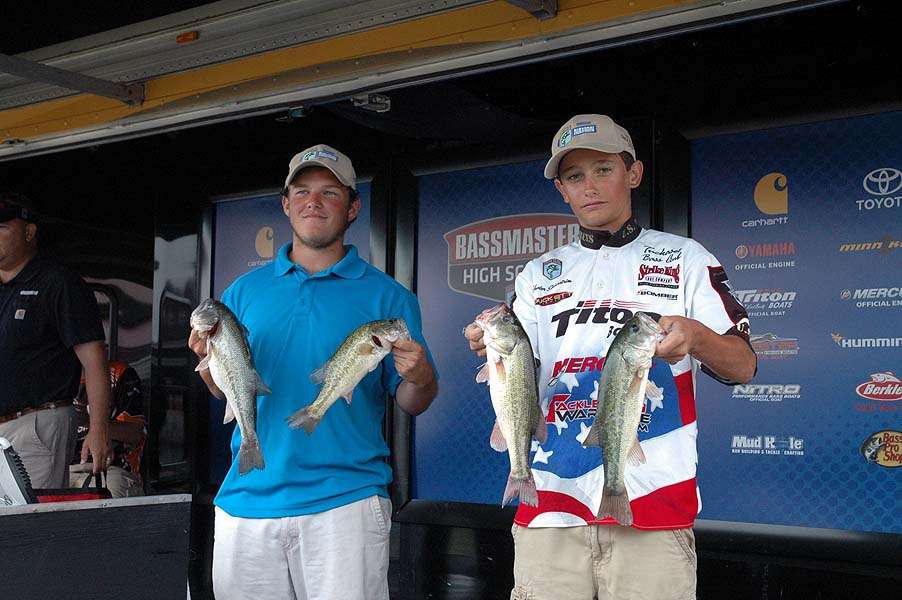 Elmer Smith and Hunter Silverstrim weigh their catch to move into fourth place. 