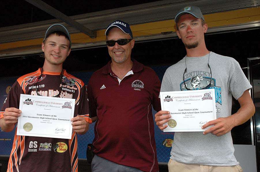 Jacob Mashburn and Cameron Brooks with their certificates for scholarships from Campbellsville University. Between them is Tommy Hall, head coach of bass fishing at the school in Campbellsville, Ky.