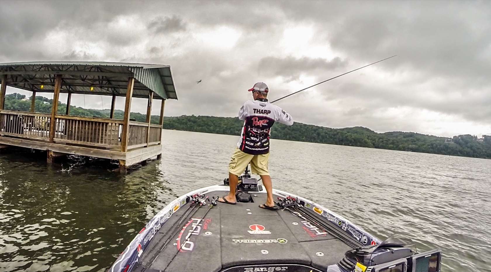 Randall Tharp lays into one only to have his jig come flying out of water as the fish pulls free.
