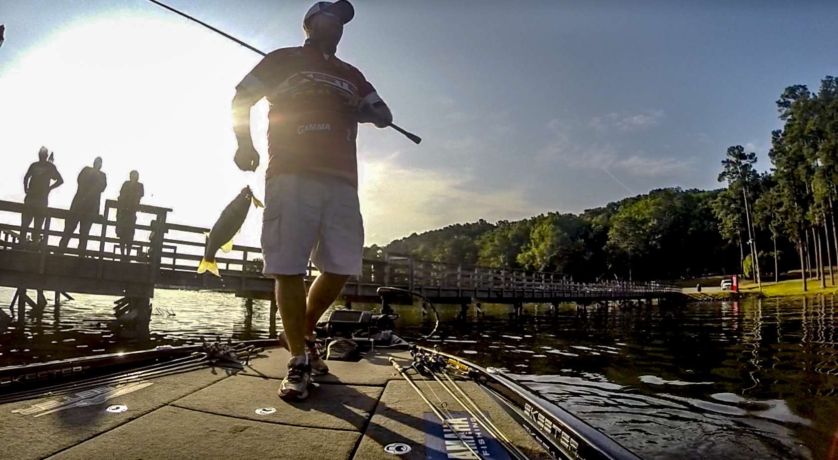 A crowd welcomes Herren back to this dock, a dock that he has caught multiple fish on throughout the week.