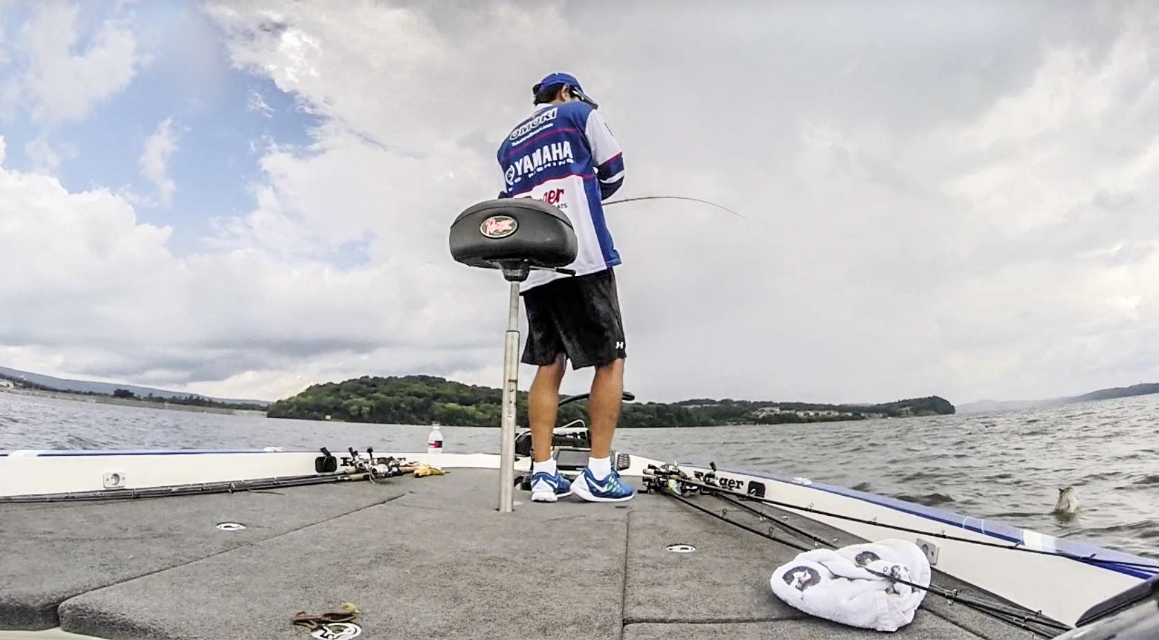 A giant breaks the surface to the side of Takahiro Omori's boat. 