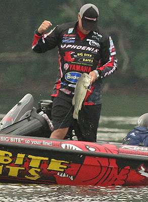 Lane gives a fist pump for his limit fish.