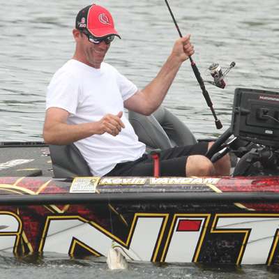 With a smile on his face, KVD sits to land the fish.
