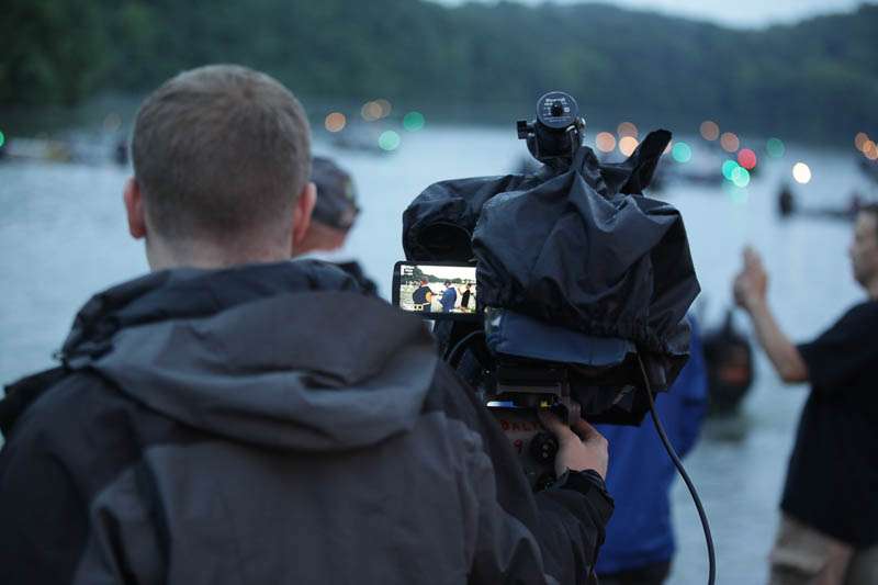 Expensive camera equipment means rain gear is a necessity. 