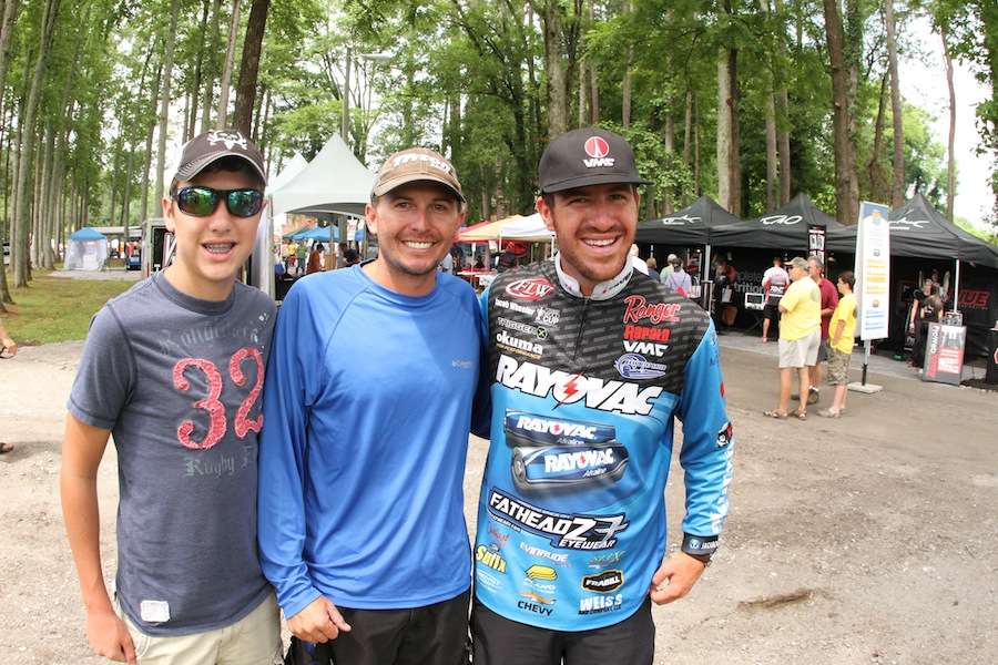 Current BASSfest leader Jacob Wheeler posing with some fans. 