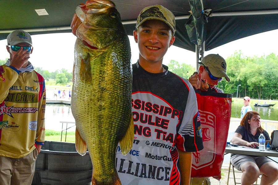 Brady McCoy showing off his 7 pound 2 ounce largemouth he caught today.
