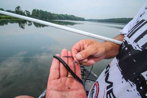 Prince uses a piece of shrink-wrap on his worm hook to keep the lure in place when dragging it on a Carolina rig.