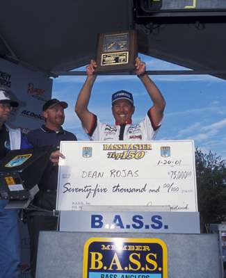 Dean Rojas is in the middle of a stellar career, but this image captures one of his iconic accomplishments. He's lifting the trophy after winning the 2001 Florida Bassmaster Top 150 on the Kissimmee Chain of Lakes. On the first day of that event, his five-bass limit weighed 45 pounds, 2 ounces -- a record that still stands.