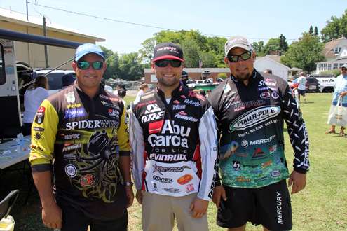 Bobby Lane, Justin Lucas and Chris Lane (left to right) pause for a quick photo together.