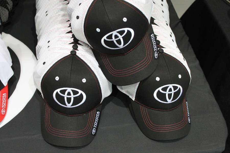 Toyota is on hand with hats for all the contestants. 