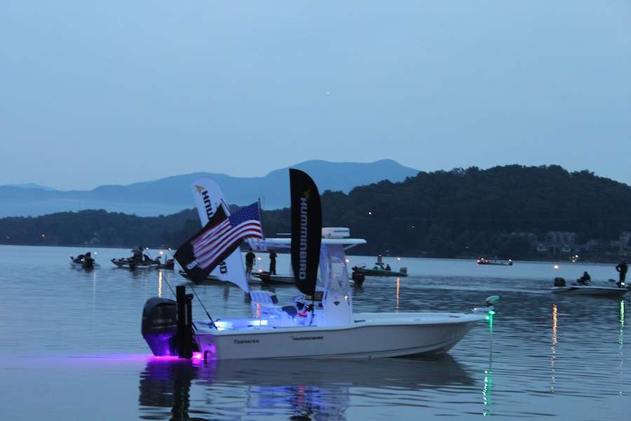 The Humminbird boat hoists the flag for the playing of the national anthem. 