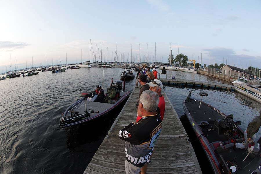 The final boats pass through the safety check line as the spectators, tournament support crews and B.A.S.S. officials wait â¦ 