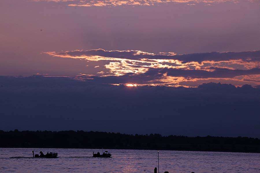 ... as the sun begins to rise over Lake Champlain. 