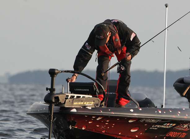Pagnato punches in a waypoint on his GPS where he caught his smallmouth. 