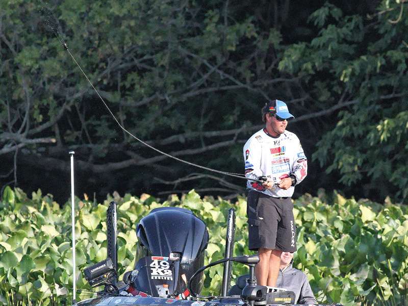 Cliff Crochet casts around vegetation during the early hours of Day 2 of the Bassmaster Elite at the Delaware River.