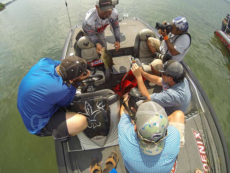 Greg Hackney had a crowd as he bagged his bass.