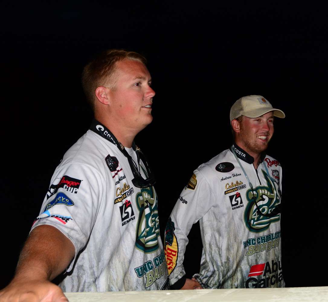Jake Whitaker and Andrew Helms of UNC Charlotte chat with a friend at launch on Day 3 of the 2014 Carhartt Bassmaster College Series National Championship.