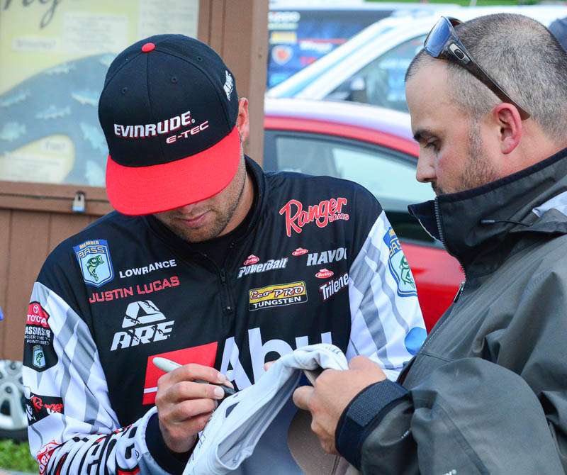Justin Lucas always has the time to sign an autograph.
