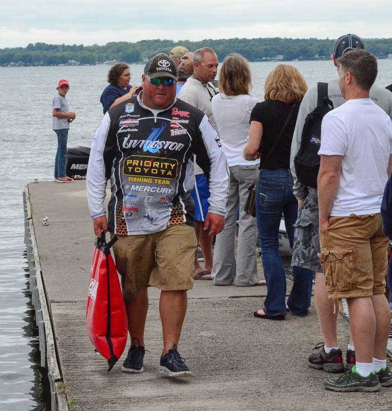 Jacob Powroznik missed the challenge, but has a bag of fish to show the crowd.