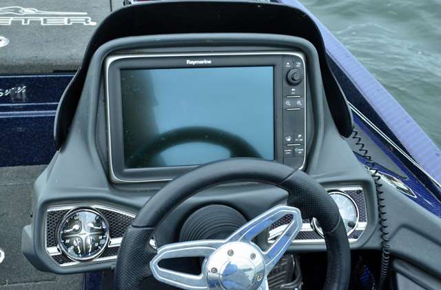 A 12-inch touchscreen Raymarine unit resides in his dash.
