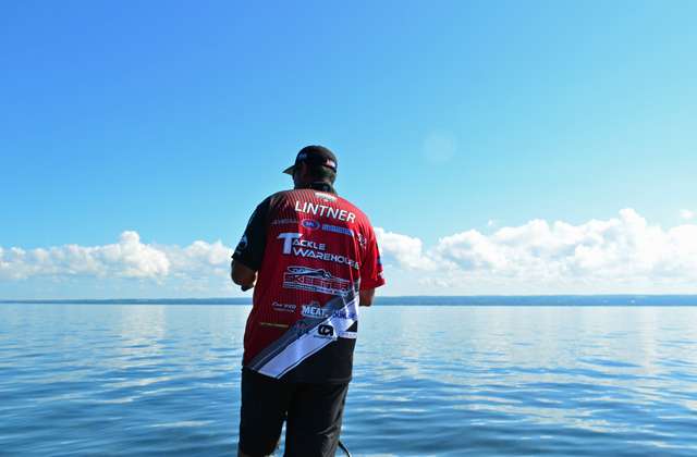 On board Jared Lintner's Skeeter, we find him pitching a jig and soft plastic with a punch skirt to holes in milfoil.