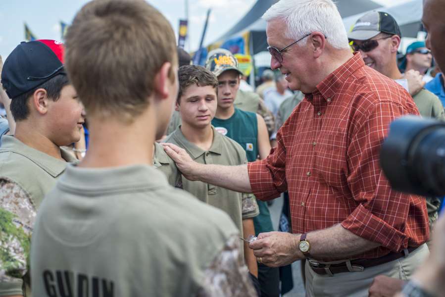 The governor meets with youth at the event.