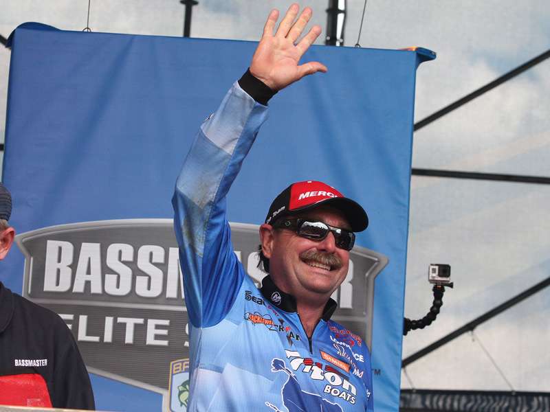 Shaw Grigsby waves to the crowd that he says in 30 years of fishing, 