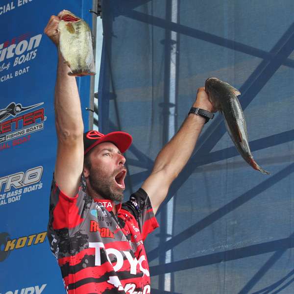 With the win in hand, Iaconelli lifts his fish high and screams, of course.