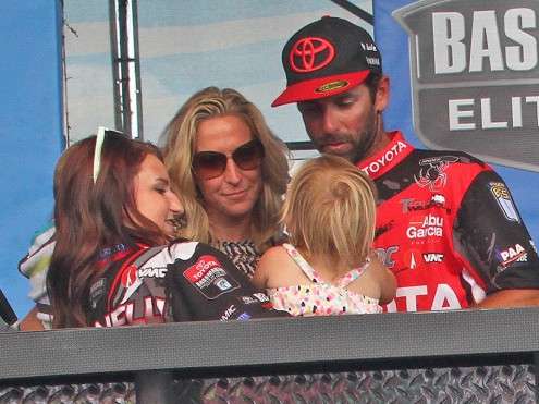 His family joined him on stage for the trophy presentation.