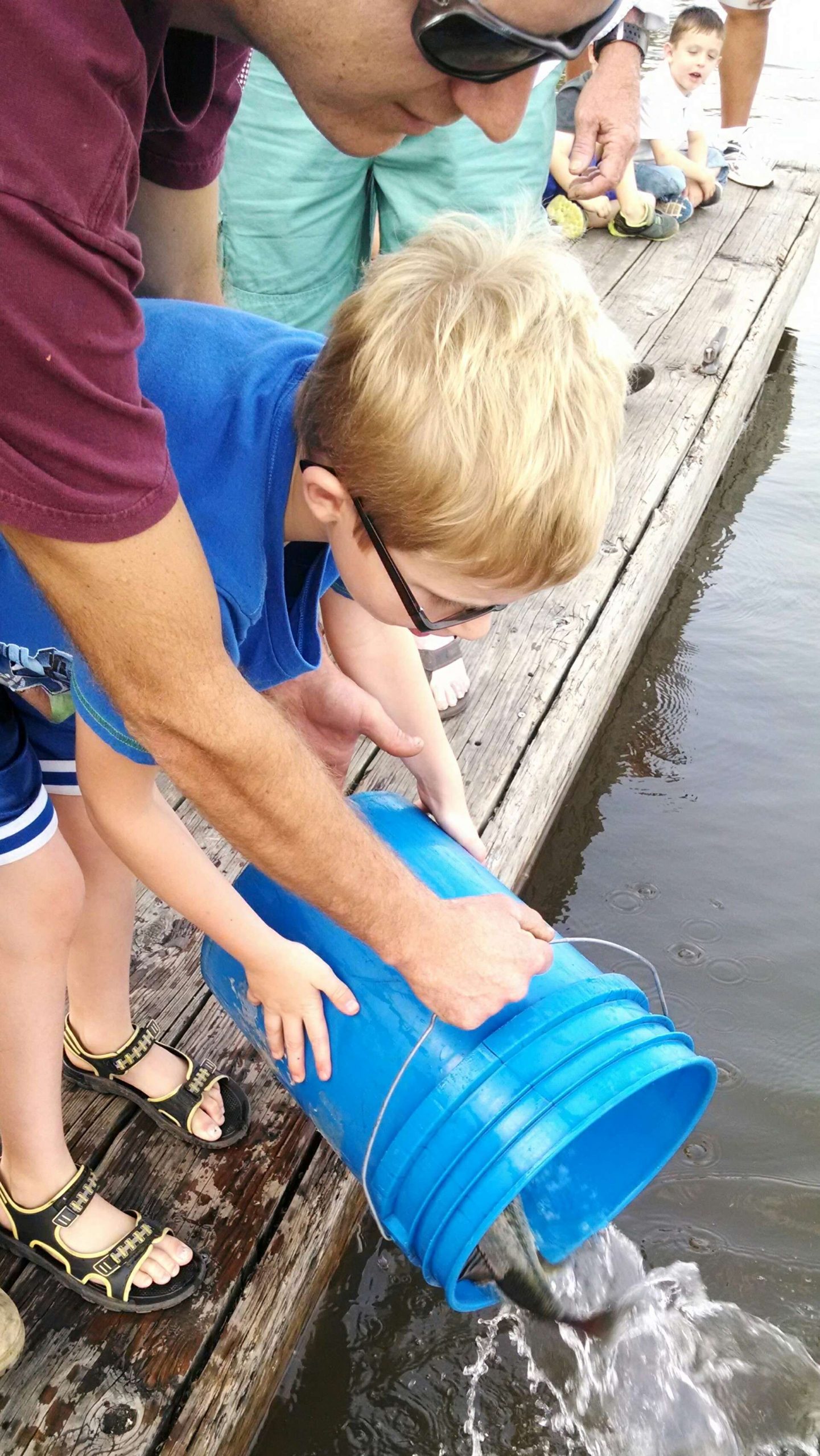 Kids and parents helped release bucket ... 
