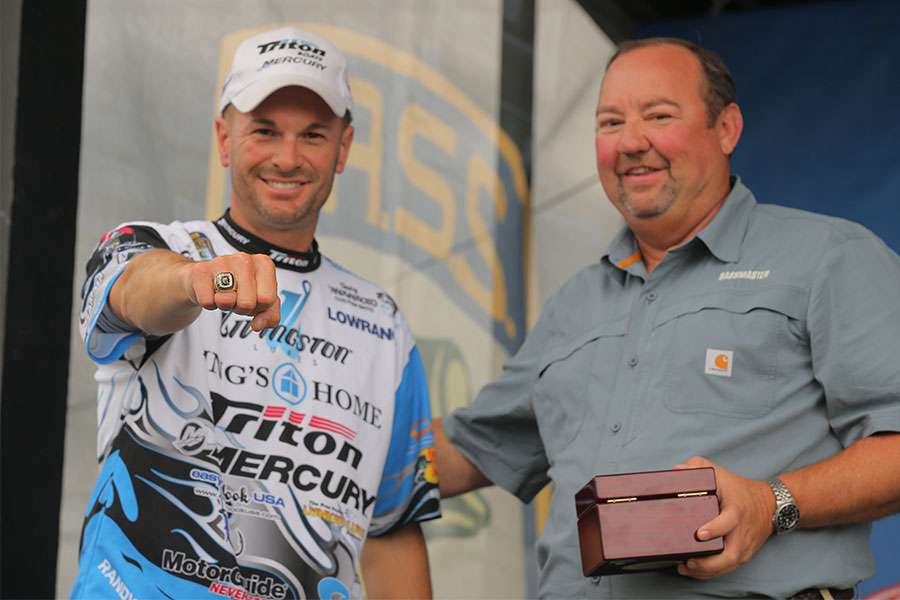 Bruce Akin of B.A.S.S. presents Randy Howell with his 2014 Bassmaster Classic Championship ring.