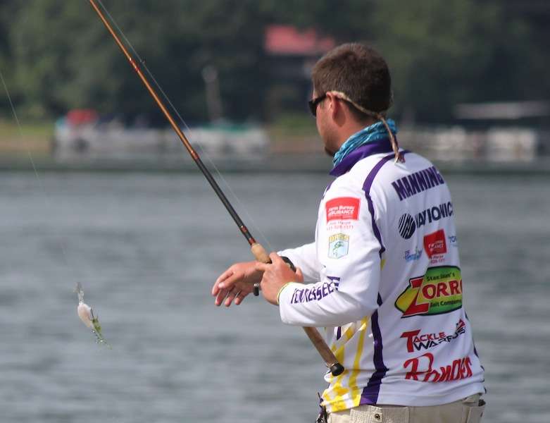 Manning grinds the bottom with a crankbait. 