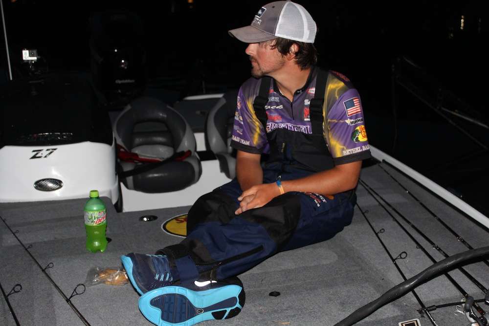 Zach Parker takes a break prior to take-off for the second round of competition in the 2014 Carhartt College Series Classic Bracket. 