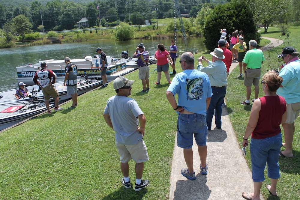 Friends and family are on hand to greet the anglers. 