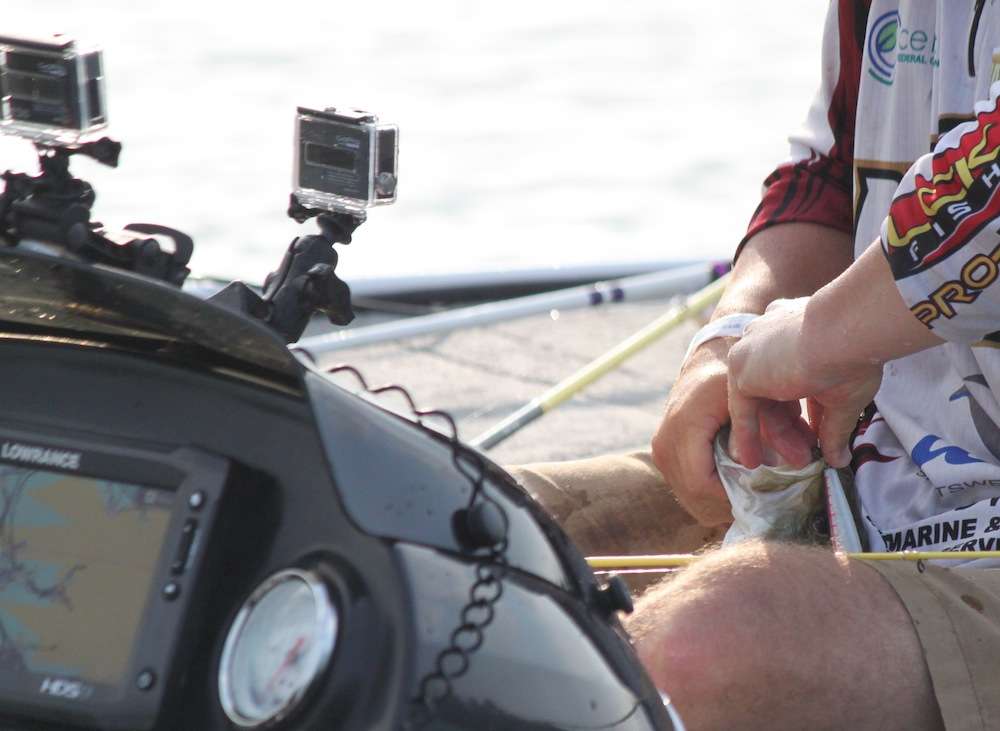 Preuett unlatches a solid fish as the action is thoroughly covered by GoPros. 