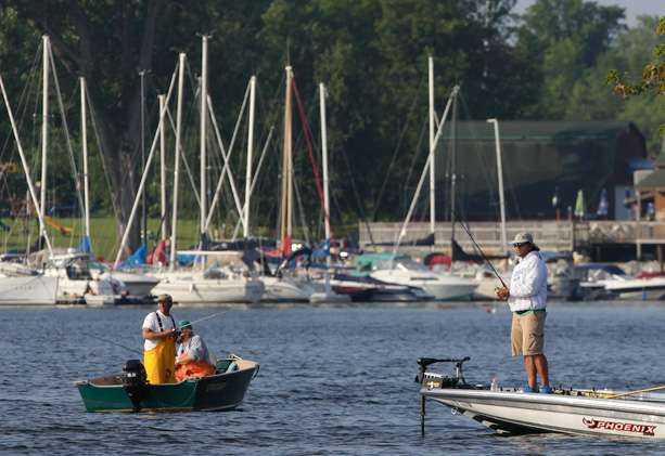 Dave Wolak shares water with a couple of local anglers. 