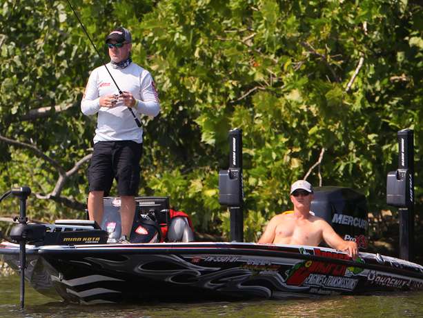 Chad Morgenthaler grinds out a day of tough fishing on the Delaware River, while his Day 1 Marshal enjoys the sunshine. 
