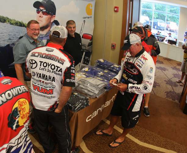 Some of the first competitors begin to arrive for the anglers' meeting on the eve of the A.R.E. Truck Caps Bassmaster Elite at Cayuga Lake. 