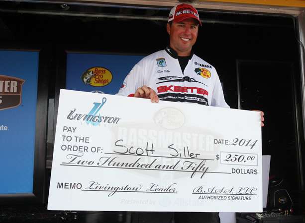 Siller shows off his big check from Livingston Lures.