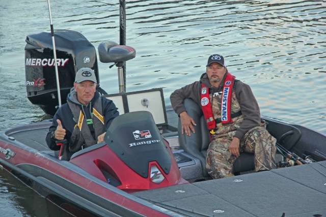 Troy Sheahan and Scott Walker sport different Toyota hats, but share the same goal â a $5,000 win.