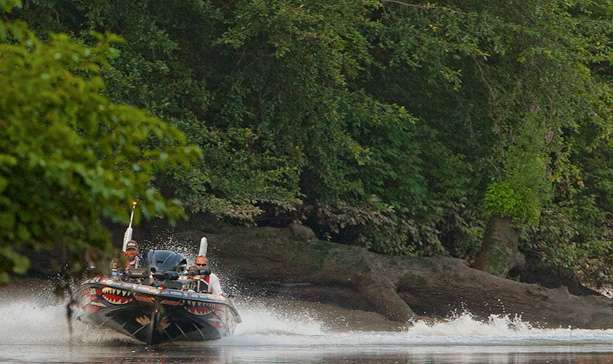 Mike Iaconelli races from the back of a creek to beat a lowering tide. 