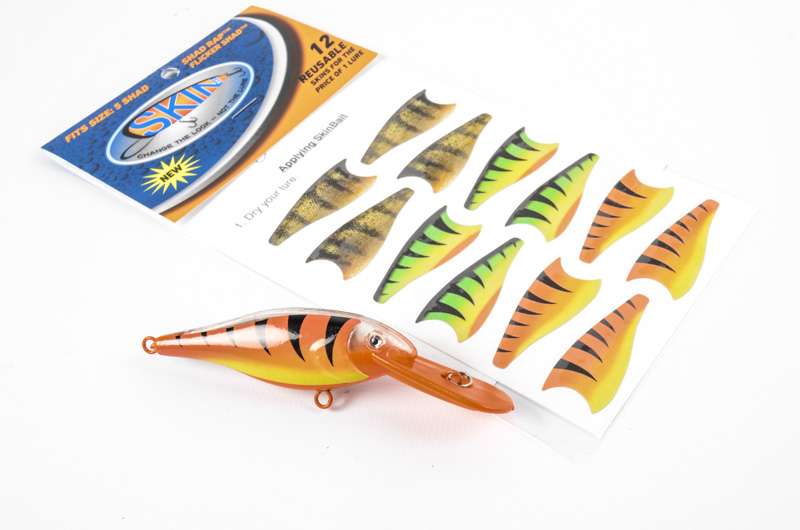 <p>SkinBait</p>
<p>SkinBait</p>
<p>SkinBait offers 12 reusable skins for the price of one lure. The SkinBait stickers can reapply up to 100 times and they stay intact after each catch.</p>