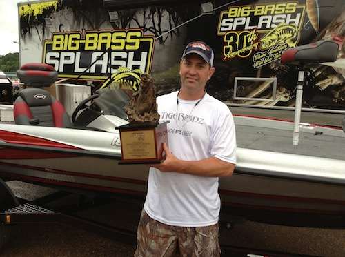 Bell with his 1st Place Triton bass boat.