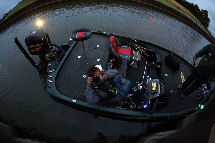 Sixth-place angler Kenta Kimura takes a pic of photographer James Overstreet while he returns the gesture.