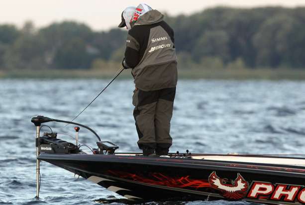 Greg Hackney pulls up on his first fishing location of the day and begins to move towards a GPS waypoint. 